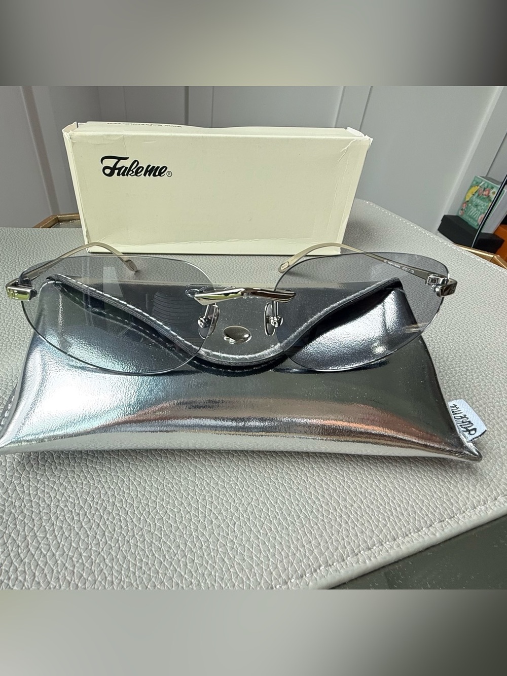 Silver Rimless Women's Glasses with Metallic Case